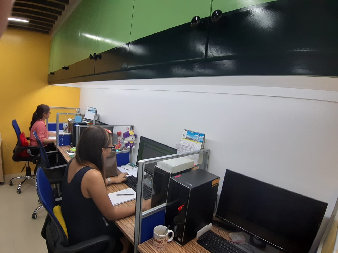 Staff at their workstations